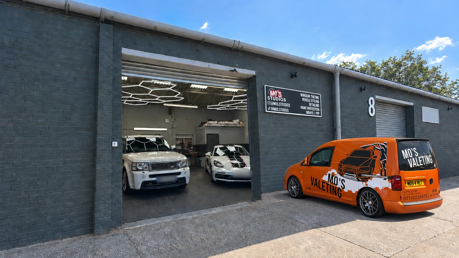 Cars inside the Braintree studio with the Mo&rsquo;s Valeting van parked outside